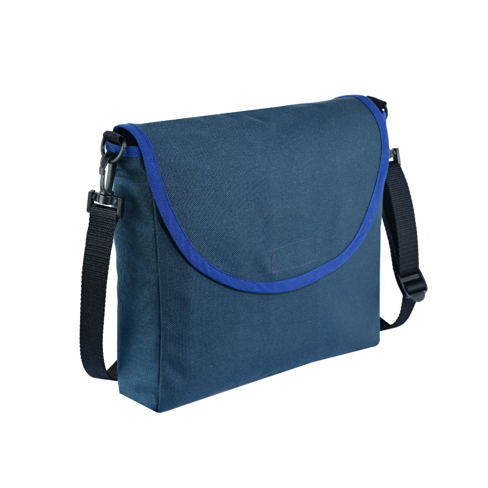Navy LVAD messenger bag with durable Canvas fabric, elastic battery holders, controller pocket, and quick-release strap.